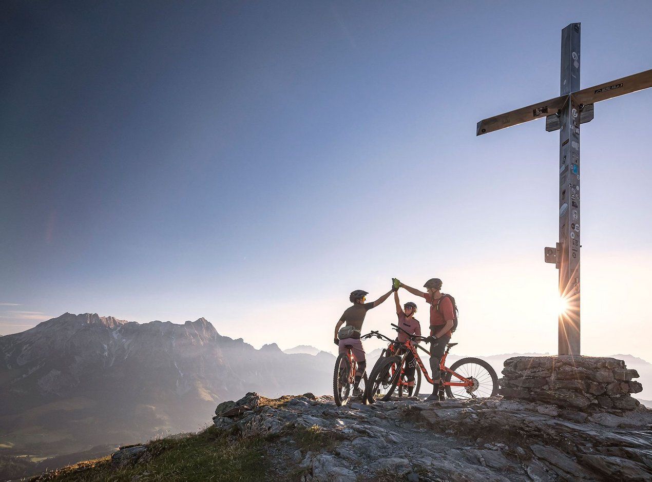 Mountain biker at the summit Mountain biker at the summit